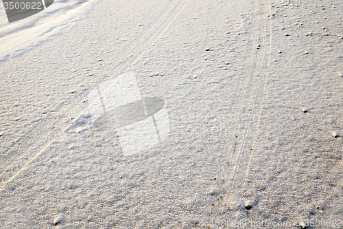 Image of car traces on snow  
