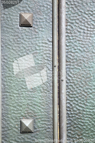 Image of   varese   abstract    r in a  door curch  closed wood  