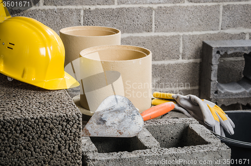 Image of Construction of modular ceramic chimney in the house