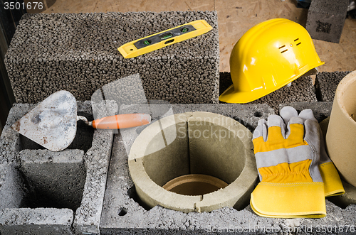 Image of Construction of modular ceramic chimney in the house