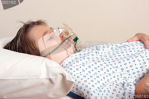 Image of Unwell child oxygen mask