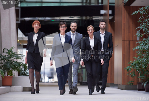Image of business people team walking