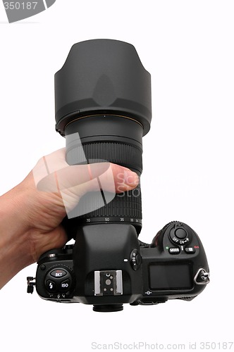 Image of Camera SLR professional in hand isolated