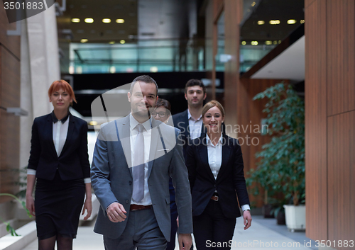 Image of business people team walking