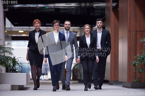 Image of business people team walking