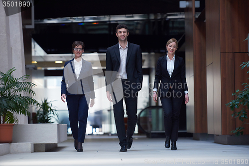 Image of business people team walking