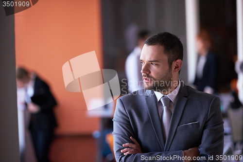 Image of young business man portrait  at modern office