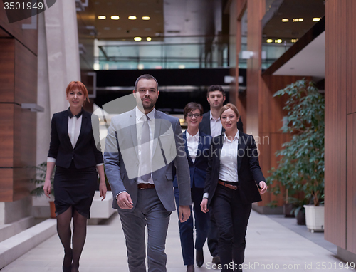 Image of business people team walking