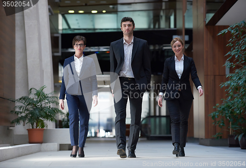 Image of business people team walking