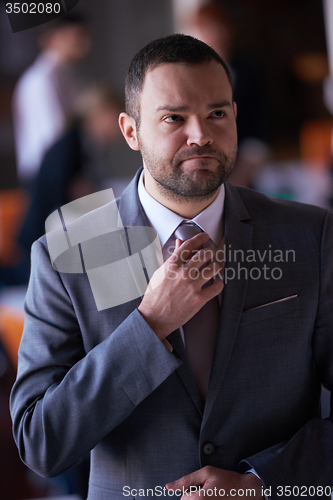 Image of young business man portrait  at modern office