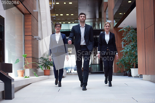Image of business people team walking