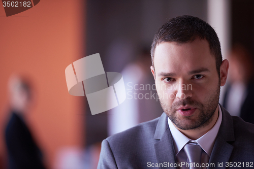 Image of young business man portrait  at modern office