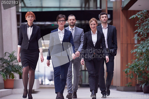 Image of business people team walking
