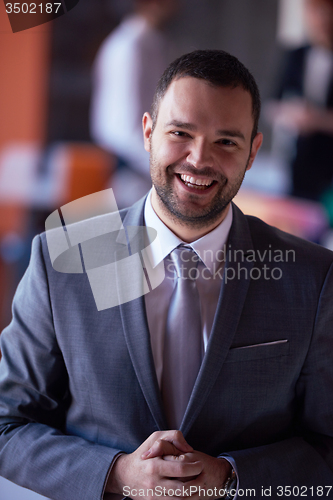 Image of young business man portrait  at modern office