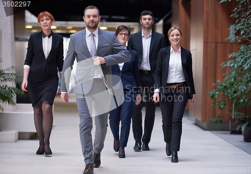 Image of business people team walking