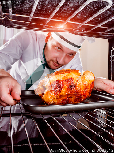 Image of Cooking chicken in the oven.