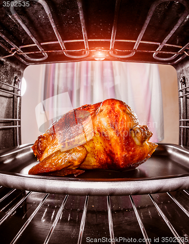 Image of Roast chicken in the oven.