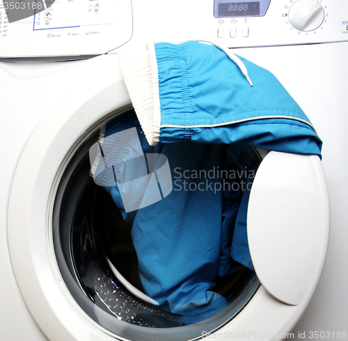 Image of Trousers and laundry.