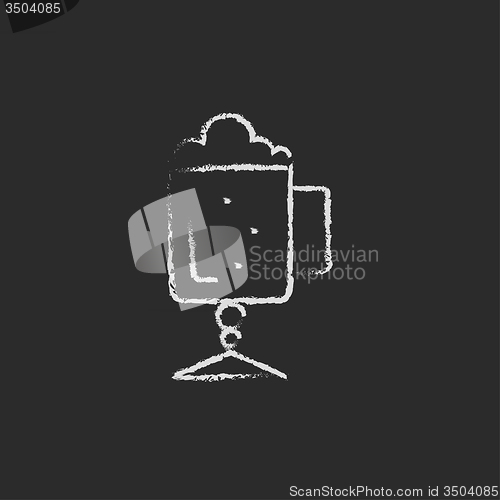 Image of Glass mug with foam icon drawn in chalk.