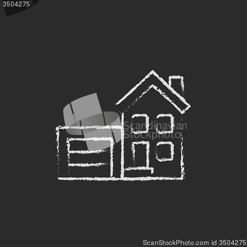 Image of House with garage icon drawn in chalk.