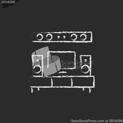 Image of TV flat screen and home theater icon drawn in chalk.