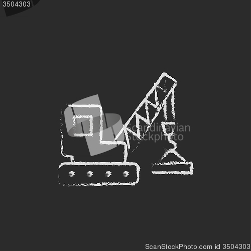 Image of Lifting crane icon drawn in chalk.