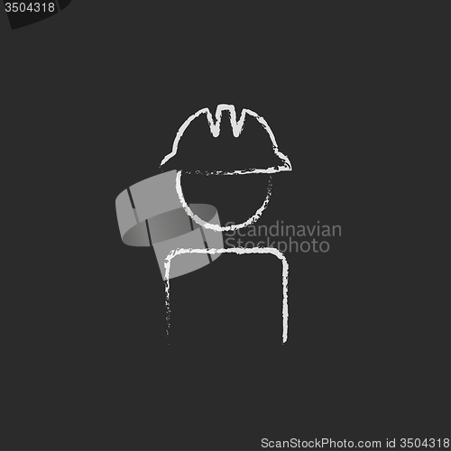 Image of Worker wearing hard hat icon drawn in chalk.