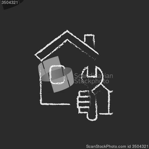 Image of House repair icon drawn in chalk.