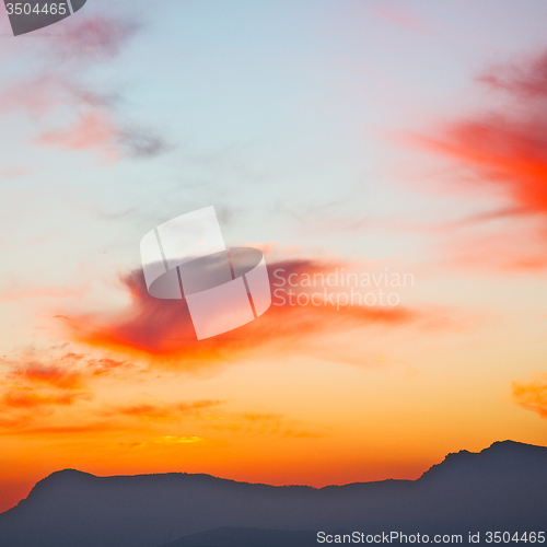 Image of mountain in morocco africa lans and red sunrise