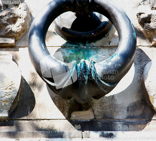 Image of blue   handle in london antique concrete  rusty  brass nail and 