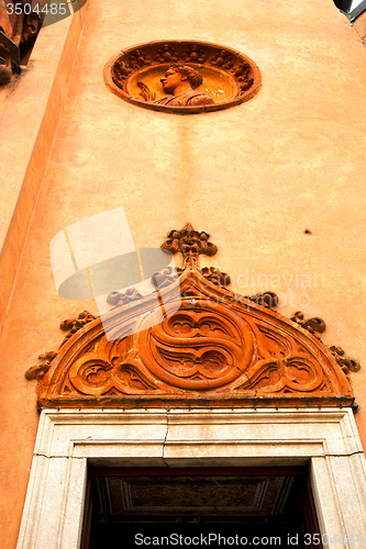 Image of  church door   in italy  lombardy     closed brick  