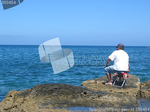 Image of OLD MAN FISHING