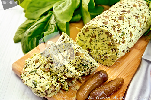 Image of Butter with spinach and greens on light board