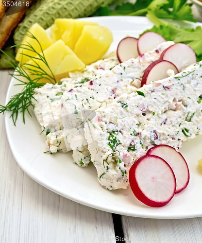 Image of Terrine of curd with potatoes on light board