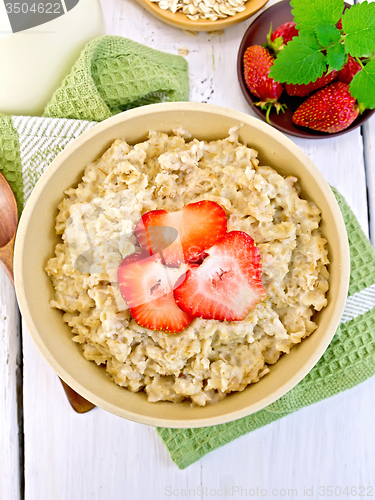 Image of Oatmeal with strawberry on light board top