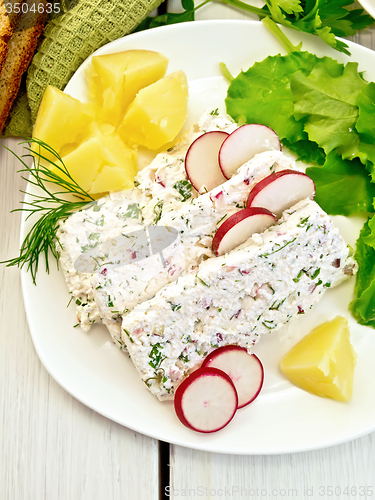 Image of Terrine of curd with potatoes on board