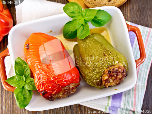 Image of Pepper stuffed meat in brown roaster top