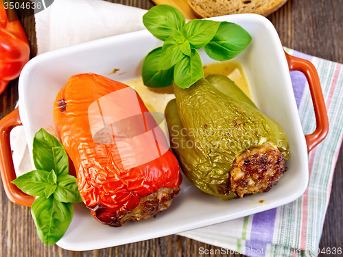 Image of Pepper stuffed meat in brown roaster top