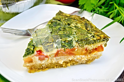 Image of Pie celtic with spinach on table