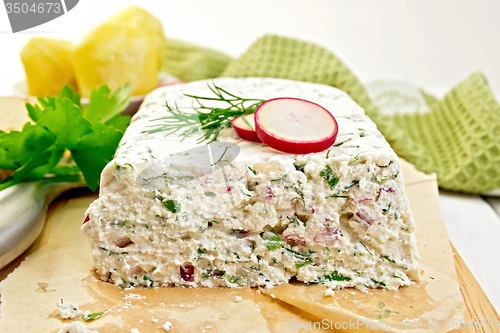 Image of Terrine of curd and radish on paper and board