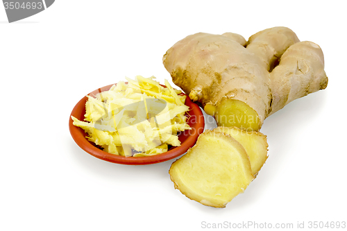 Image of Ginger grated in bowl with root