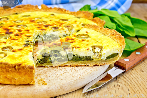 Image of Pie with spinach on the board