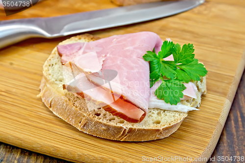 Image of Sandwich with ham and knife