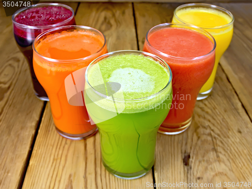 Image of Juice vegetable in five glassful on board