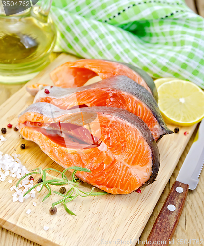 Image of Trout on board with knife and napkin