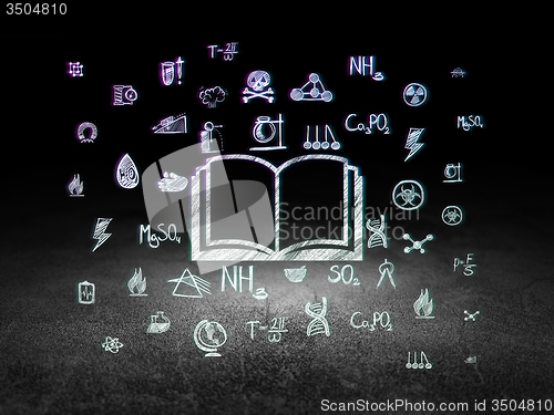 Image of Science concept: Book in grunge dark room