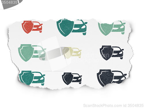 Image of Insurance concept: Car And Shield icons on Torn Paper background
