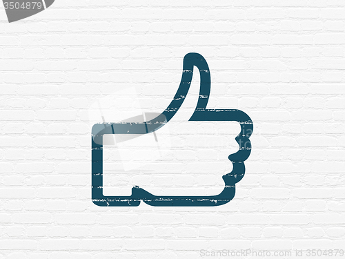 Image of Social media concept: Thumb Up on wall background