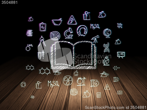 Image of Science concept: Book in grunge dark room