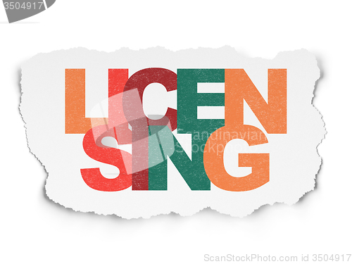 Image of Law concept: Licensing on Torn Paper background